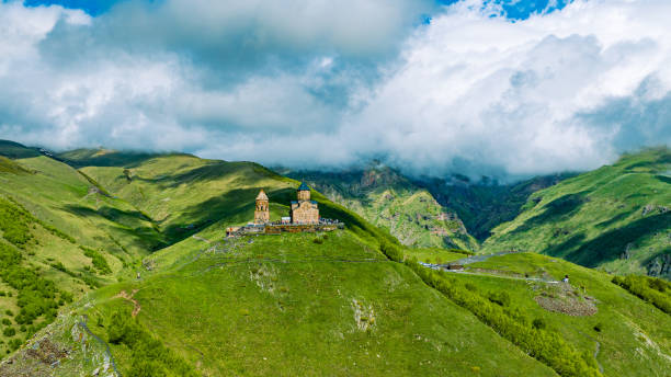 istock Gergeti Trinity Church against Caucasus mountains in Georgia 1496335538