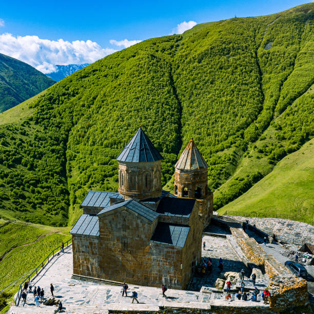 istock Gergeti Trinity Church against Caucasus mountains in Georgia 1496335645