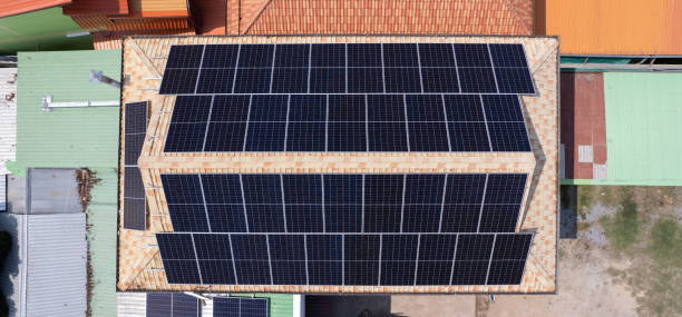 istock Solar panels on a roof. Drone view. Environment and technology concepts. 1496340001
