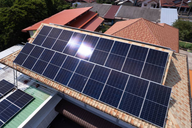 istock Solar panels on a roof. Drone view. Environment and technology concepts. 1496340034