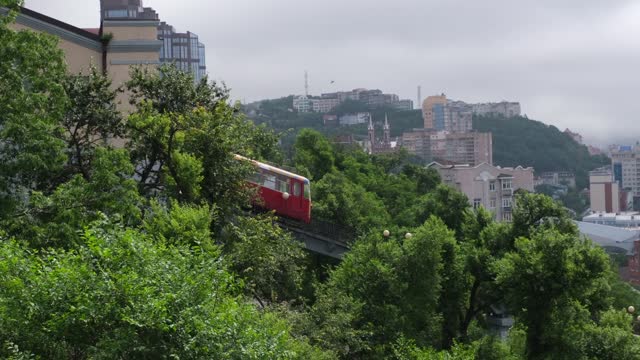 Red funicular wagon is going up in Vladivostok, Russia