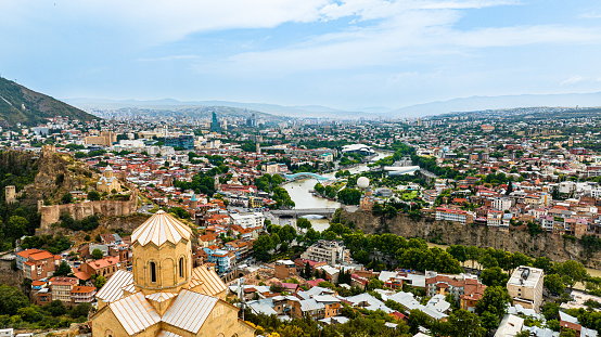 Woman enjoy view of Tbilisi from Narikala fortress, Georgia.