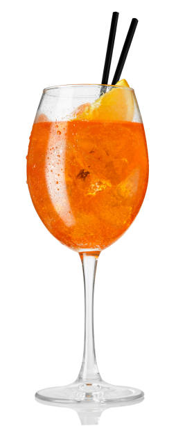 glass of Spritz cocktail with black straws isolated on white stock photo