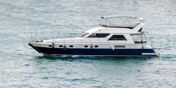 Motor speed boat yacht at open sea. Deep blue water