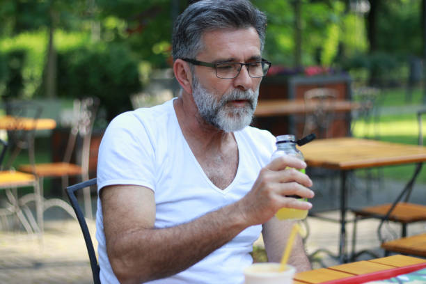 istock Modern senior relax in cafe 1496354656
