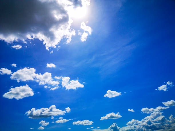 istock clouds and blue sunny sky,  white clouds over blue sky, Aerial view,  nature blue sky white cleat weather. 1496366799