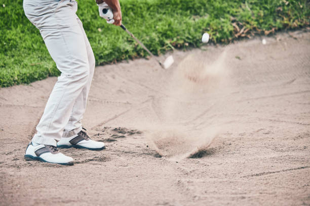istock Golf course, man and swing in sand pit for shot, sports and training for hazard with power, aim and fitness. Golfer, bunker and dirt with club with sport, exercise and outdoor mockup space in summer 1496368461