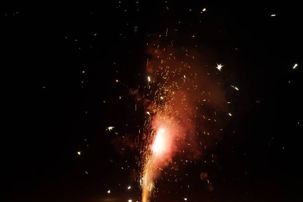istock Spectacular firework display illuminated in the night sky 1496371351