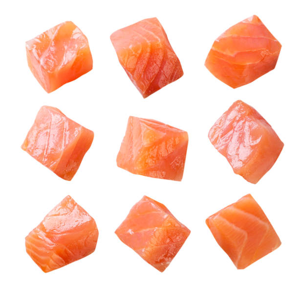 istock Set of trout cubes close-up on a white background. 1496374948
