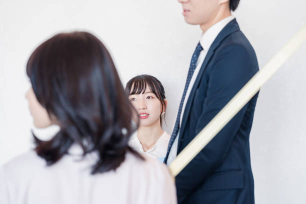 istock Young businesspeople talking friendly in an office 1496375158