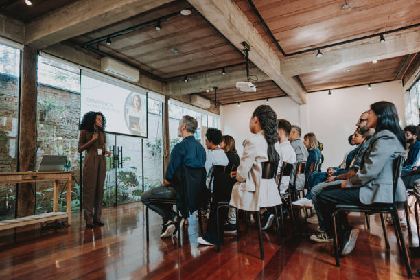 Woman giving speaker presentation
