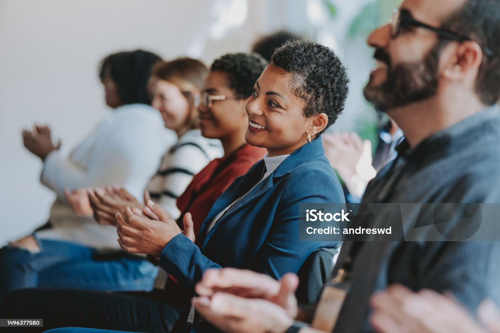 Group of people applauding Meeting Stock Photo