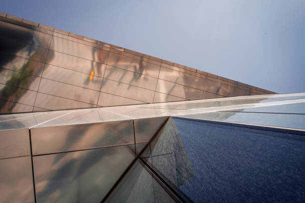 istock Low angle view of a modern building against clear sky 1496381218