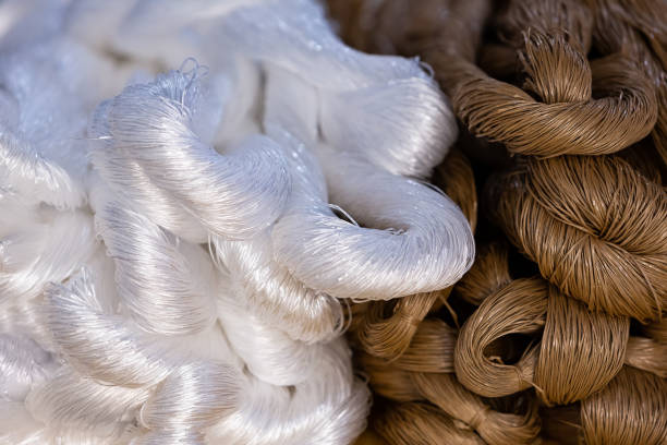 Manufacture of spools of white and neutral polyester skeins  from plastic material - Buenos Aires - Argentina