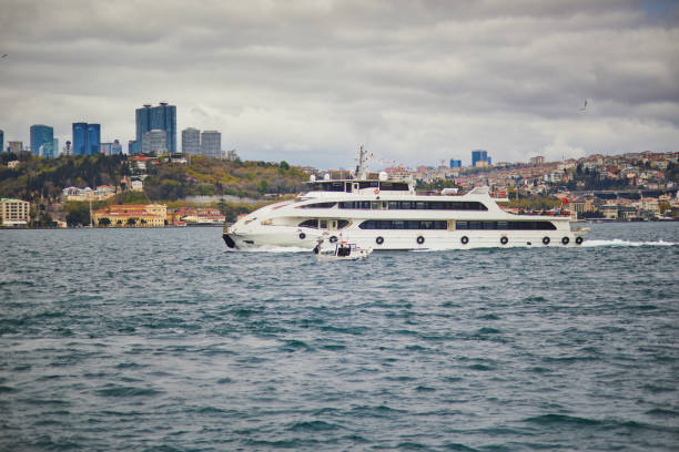 Passenger ferry sails across the Bosphorus strait in Istanbul, Turkey