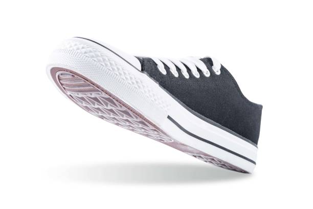 istock Black sneakers on a white isolated background 1496389473