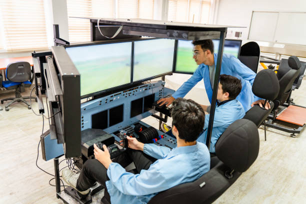 estudiantes de formación profesional formación en simulador de vuelo - pilot cockpit airplane training fotografías e imágenes de stock