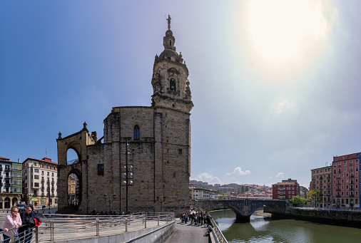 Bilbao, Spain - April 15, 2022: Panoramic view of the church of San Antón and the bridge of San Antón in Bilbao over Tío Nervión