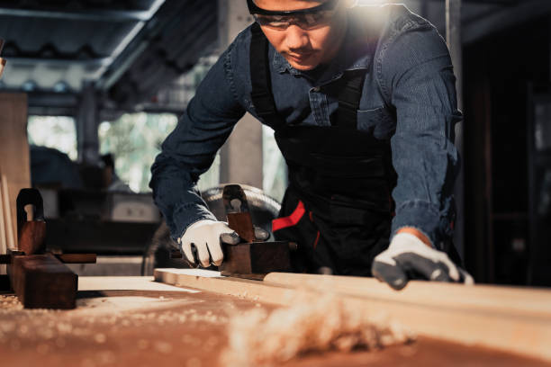 istock The process of creating snooker cue sticks with handmade work, skilled carpenters create snooker cue sticks, handmade work. Choosing to focus on the picture in only some details. 1496391880