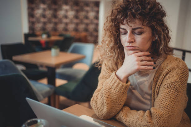 istock A young female freelancer who is visibly tired and nervous from too much work. 1496392163