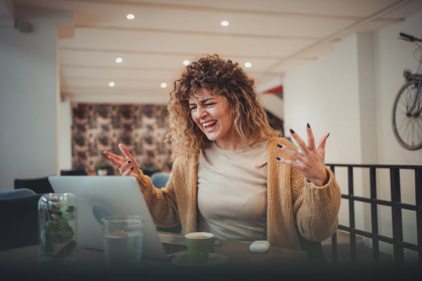 istock A young female freelancer who is visibly tired and nervous from too much work. 1496392575