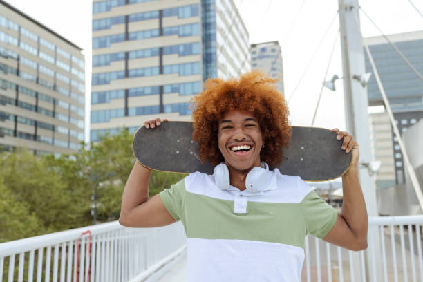 istock Young African American man with skateboard 1496398021