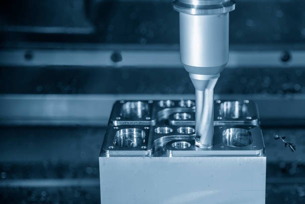 istock The CNC milling machine rough cutting the injection mold parts by indexable tools. 1496400437
