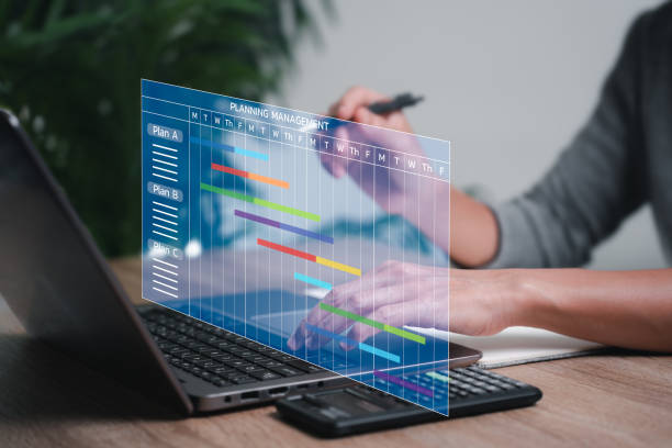 istock Business work planning and project management concept, Businesswomen use laptops for project management progress plan with augmented reality chart schedule on virtual screen, marketing grown plan 1496402463