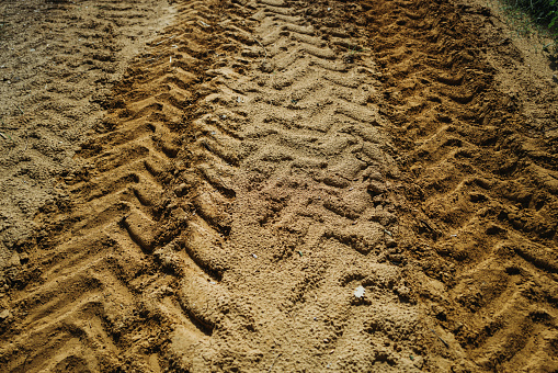 Country road with tractor tracks