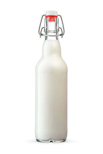 Fresh milk a glass bottle with vintage swing top cap isolated on white background with clipping path.