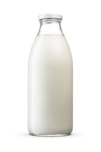istock Fresh milk a glass bottle with twist off screw cap isolated on white background. 1496406402
