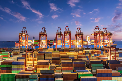 Night view of large container terminal port. Seaside port landscape in China