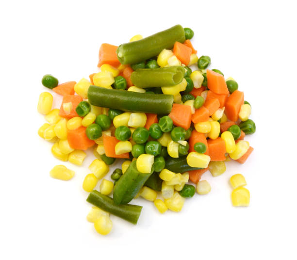 istock Fresh mixed vegetables on white. Golden mix. 1496409586