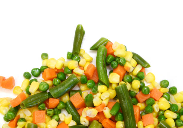 istock Fresh mixed vegetables on white. Golden mix. 1496409587