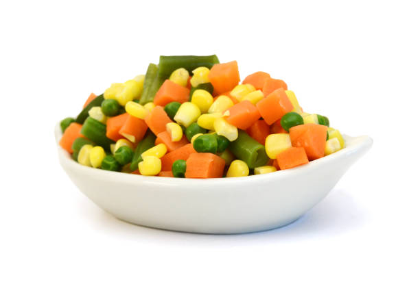 istock Fresh mixed vegetables on white. Golden mix. 1496409660