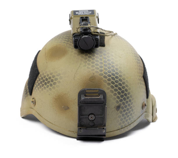 istock Camouflage military helmet isolated on white background 1496409767
