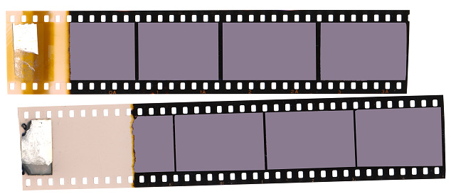 Old fashioned vintage,35mm filmstrip with empty frames for pictures,isolated on white background