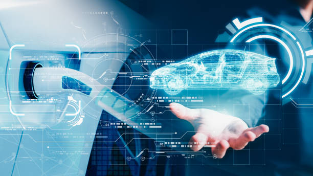 Businessman controlling hologram to autopilot Electric vehicle background. Man in EV car using blue AI user interface and machine learning command charging system. Innovative technology transportation stock photo