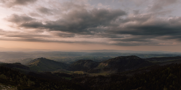 Polish landscape in Zakopane, Lesser Poland Voivodeship, Poland. Tatra Mountains, Malopolskie Province. Rock and mountain, national park photography in Europe. Clouds, sky, and hill.