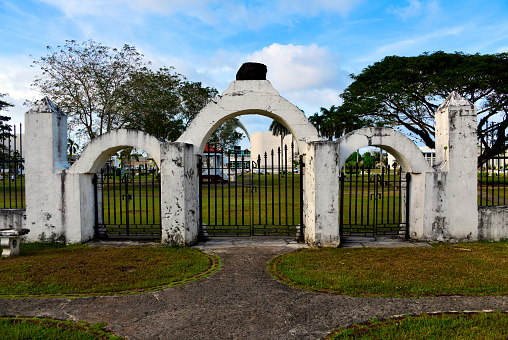 Hagåtña / Agana, Guam: Plaza de España -  location of the Governors Palace for centuries of Spanish presence - three-arch gate to ancient Almacen (Arsenal) - the palace itself was destroyed by American bombs during the Greater East Asia War (Pacific War / 大東亜戦争) against the Empire of Japan