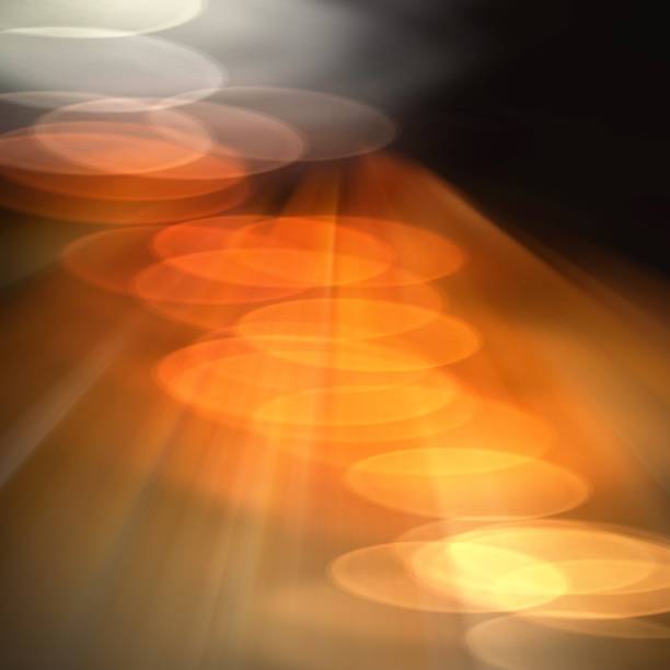 istock Orange and dark purple bokeh background 1496419444