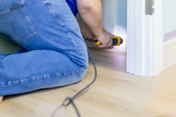 istock A person is using a power tool for walk-in closet installation 1496430035