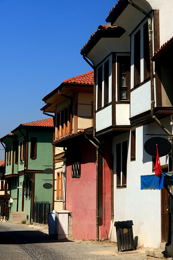 Street view with colorful old houses against the clear blue sky in the historical part of the city of Eskisehir