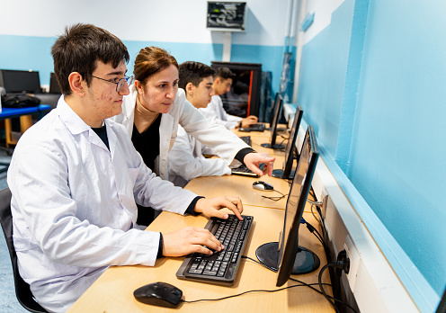 Students learning computer programming, Vocational education