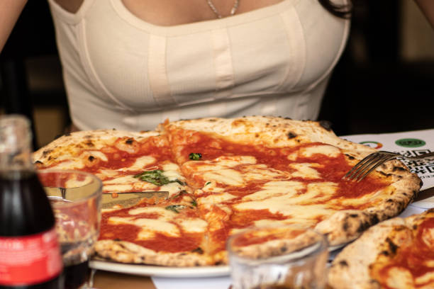 istock Pizza Margherita with tomato sauce, mozzarella and basil 1496436927