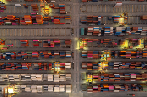 istock Top viewContainer ship loading and unloading in sea port, Aerial view of business logistic import and export freight transportation by container ship in harbor, Container loading Cargo freight ship, Dubai 1496436928