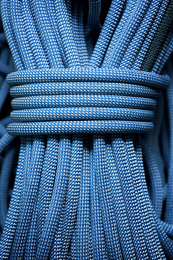 Blue climbing rope close up.