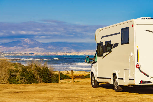 istock Rv motor home camping on beach 1496443825