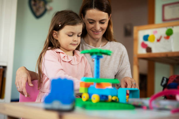 istock Little child playing with mother 1496443883