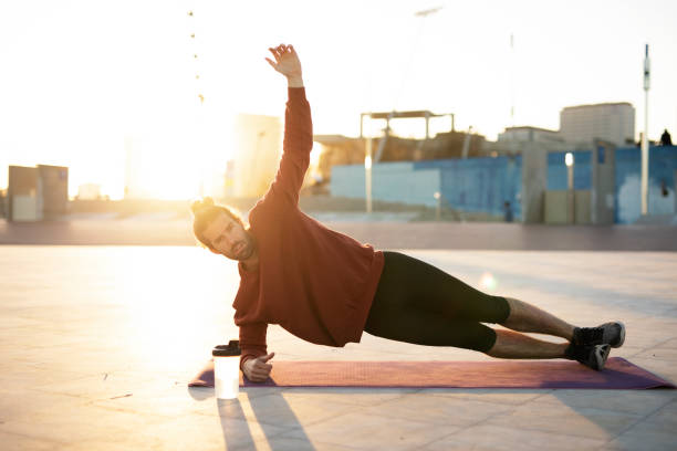 istock Fit sexy guy doing exercise outdoors 1496446903